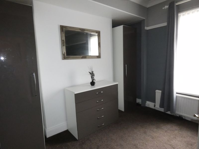 Bedroom One- click for photo gallery